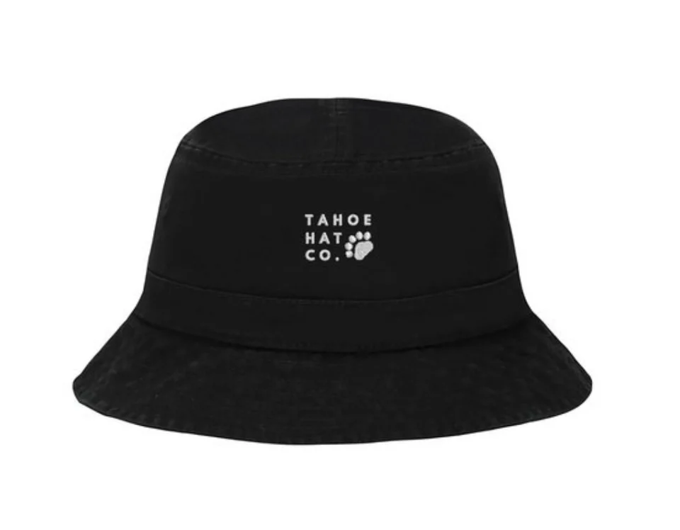 Black bucket hat with Tahoe Hat Co paw artwork